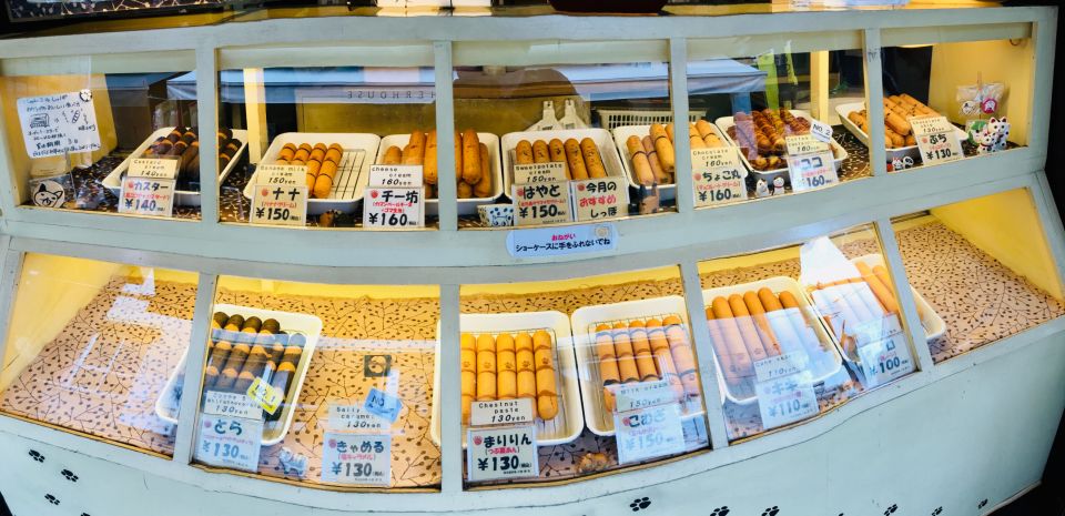 Yanaka & Nezu: Walking Tour in Tokyo's Nostalgic Old Towns - Local Delights and Street Food