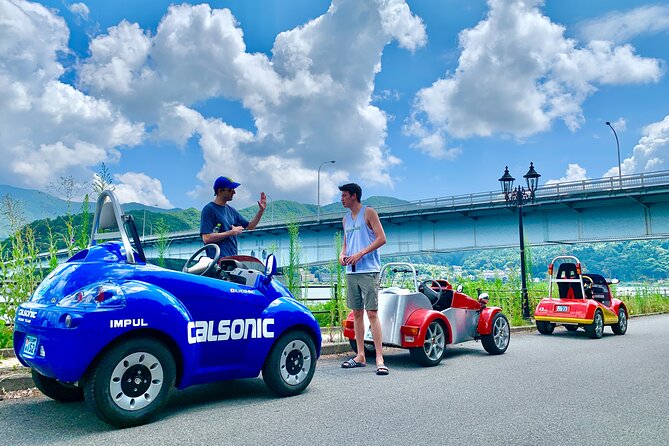 Cute & Fun E-Car Tour Following Guide Around Lake Kawaguchiko - The Sum Up