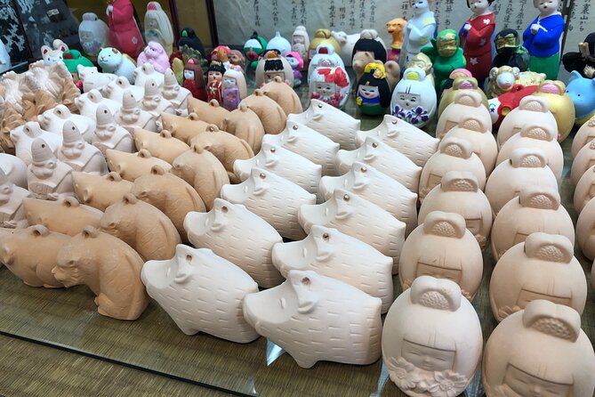 Fukuoka Open Top Bus and Hakata Doll Painting Experience With Guide Quick Takeaways